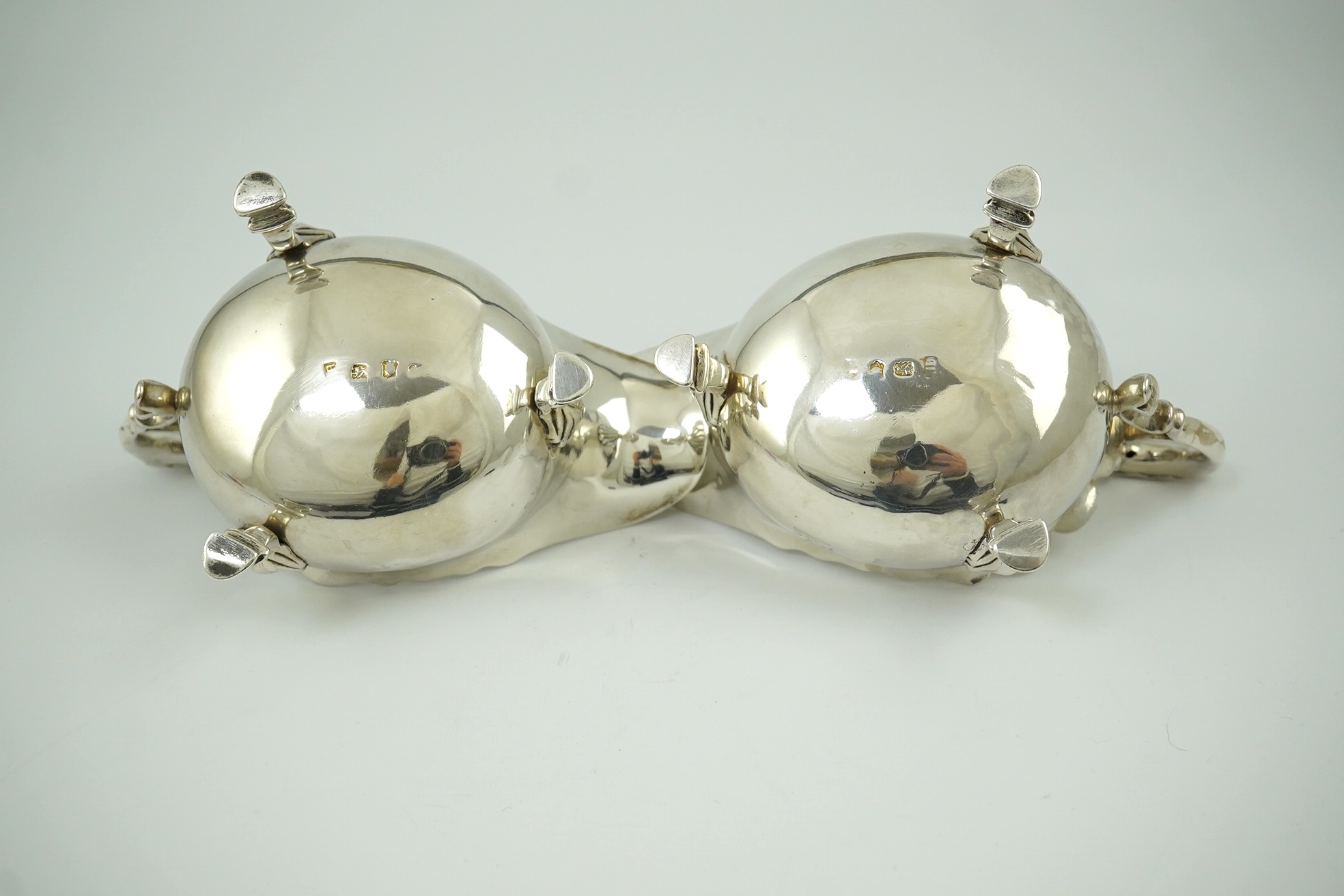 A pair of George II silver sauceboats, by Henry Brind